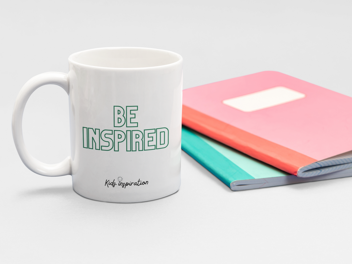 Back of You are Somebody mug says Be Inspired in green letters