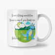 This blue dinosaur kids mug says Everything would be Roarsome if you keep on believing with a bright sun and colorful landscape in the background